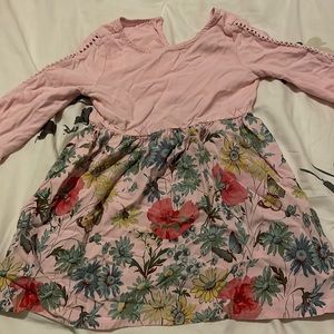 Beautiful flower and pink dress. Perfect for Spring and summer.